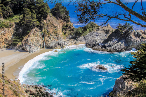 A beautiful blue ocean with a rocky shoreline