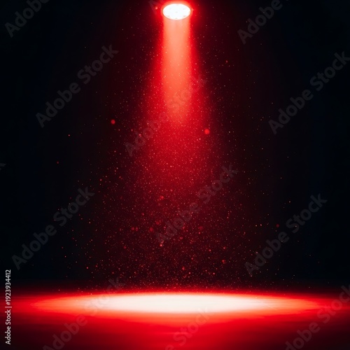 Red spotlight on dark stage dramatic light beam entertainment.