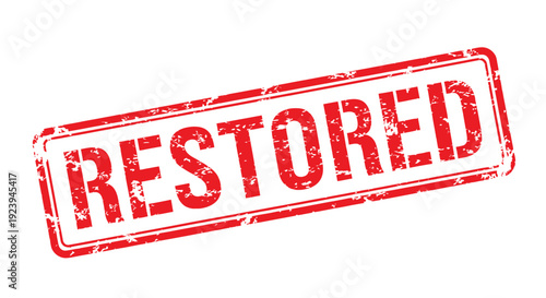 A red rectangular stamp displaying the word restored in bold white letters