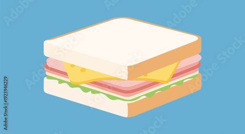 sandwich with ham cheese and lettuce on white bread.