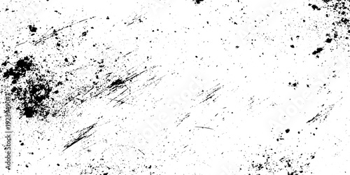 Monochrome grunge texture background with black and white particles cracks chips stains scratch lines and dirty distressed surface pattern.