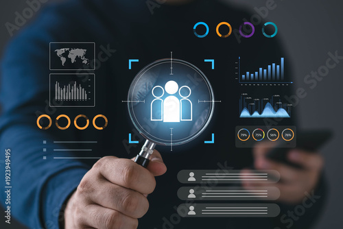 Business professional analyzing customer data with magnifying glass and digital dashboard. market research, user analytics, audience targeting, CRM, data driven strategy, business intelligence.
