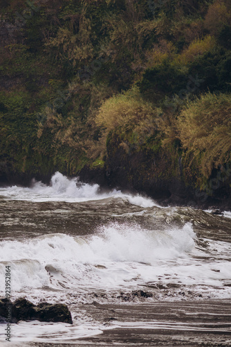 incredible views of the mountains and the ocean, splashes of water and the sound of waves
