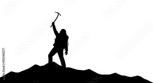 Silhouette Climber on Mountain Peak.