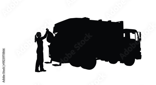 Person interacting with a large vehicle depicted as a silhouette