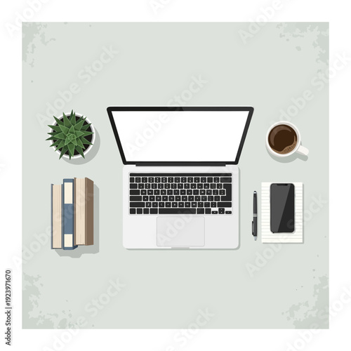 A laptop and office supplies on a desk