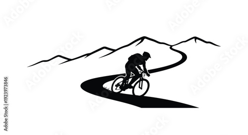 Cyclist riding a mountain bike on a winding road silhouette