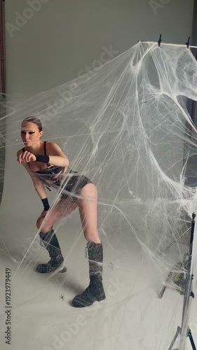 Creative Photoshoot: Woman in Giant Spider Web