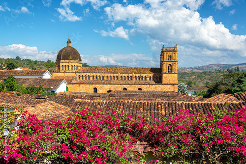 Barichara cathedral dome and bougainvillea flowers in Colombia