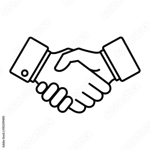 A handshake between two people in a business setting