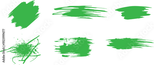 Set of green paint brush strokes isolated on white background. Abstract grunge swashes with textured bristle edges. Creative artistic elements for branding, posters, and design projects. 