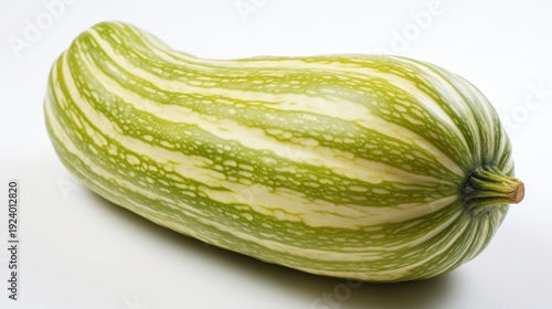 Striped delicata squash isolated on white surface