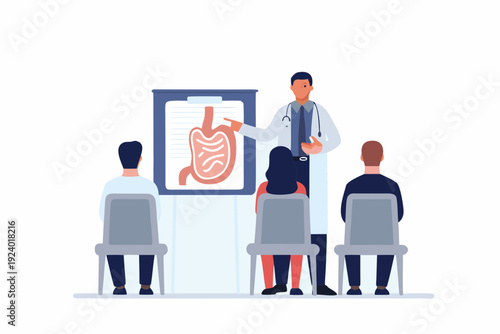Doctor explaining human digestive system anatomy to a group of medical students