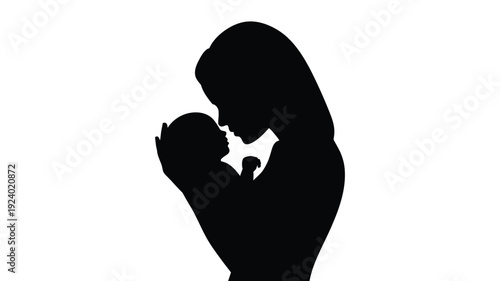 Silhouette of a mother holding and kissing her baby loving family moment tender silhouette black and white