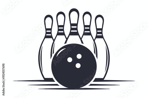 Black and white bowling ball ready to strike five pins arranged neatly