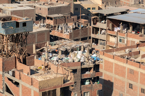 Garbage processing and storage on a rooftop in Manshiyat Naser, a garbage city. Cairo, Egypt.