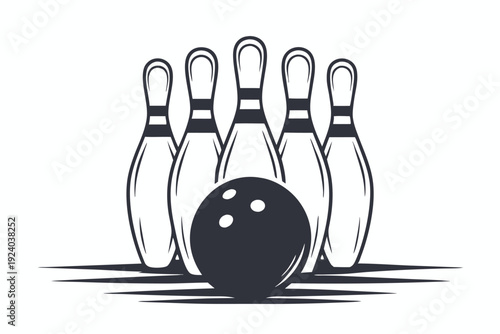 Black and white bowling ball ready to strike five pins arranged neatly