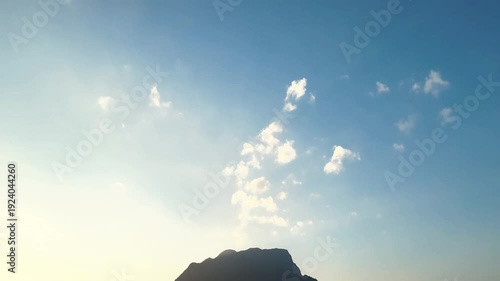 vdo drone move at Aerial View of Doi Luang Chiang Dao Mountain with Rural Landscape and Sun Rays, Chiang Mai Thailand