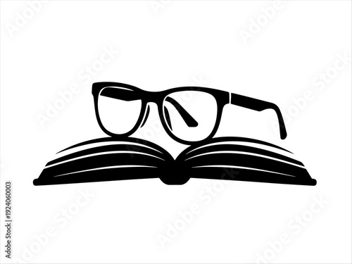 Open book silhouette with eyeglasses resting on top, symbol of reading and knowledge.