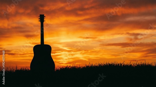 Silhouette Of Guitarist Playing At A Beautiful Sunset