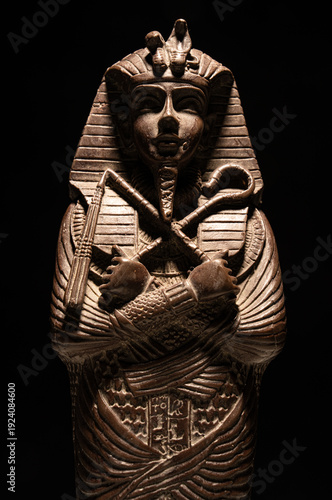 A historical egyptian sarcophagus with a mummy inside	