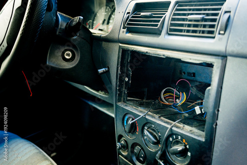 Konstfotografi stolen radio from car, car burglary of parked car, concept of safety and crimina