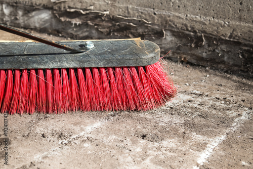Принти на полотні Broom on concrete floor stripped of waterproofing membrane