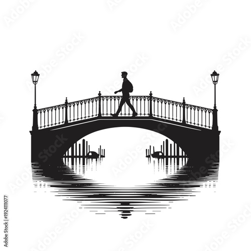 Silhouette man walking on bridge at nighttime