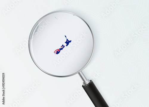 New Zealand Map Under Magnifying Glass with National Flag Overlay.