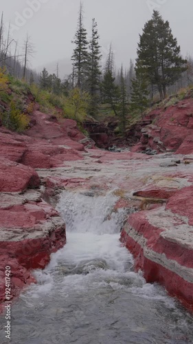 Wallpaper Mural Red Rock Canyon waterfall flowing through argillite in Waterton Lakes National Park Torontodigital.ca