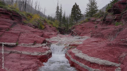 Wallpaper Mural Red Rock Canyon waterfall flowing through argillite in Waterton Lakes National Park Torontodigital.ca