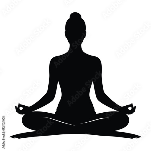 Silhouette of a woman meditating in a peaceful lotus position