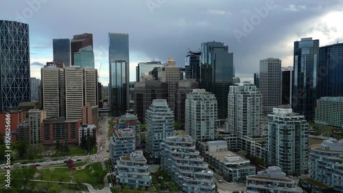 Wallpaper Mural Calgary skyline panoramic view showing modern skyscrapers and residential buildings along Bow River Torontodigital.ca