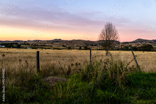 Dusk over a rural Eswatini landscape, in the Hhohho Region.