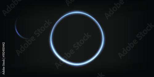 Ethereal Blue Glowing Energy Ring Floating in Dark Space with Soft Light Aura and Futuristic Abstract Background