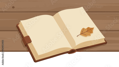 Handmade leather grimoire with dried leaf on wooden table