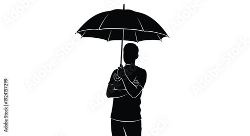 Silhouette of a person holding an umbrella.