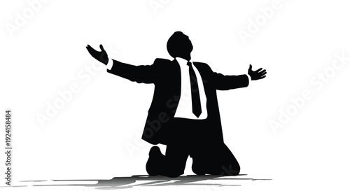 Silhouette of a businessman kneeling with arms outstretched.