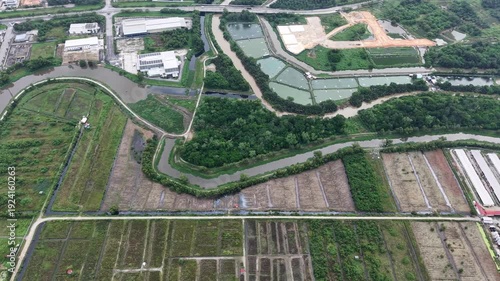 Drone overhead view of fish farm ponds and canals