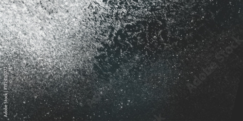 Flour spilling on black background. Abstract design of white powder cloud. Abstract wallpaper design of white color shiny snow dust powder isolated on black background .


