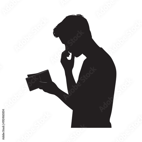 Silhouetted man thoughtfully reading a book in a contemplative pose