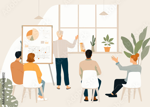 A business meeting takes place with a presenter and engaged team members