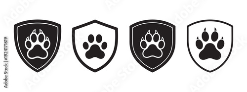Four black shield icons with white paw print inside on white background