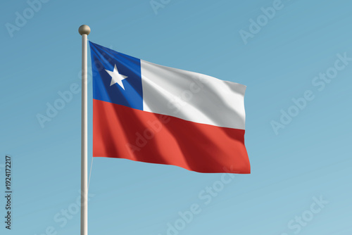 Chile national flag waving on pole against clear blue sky background.