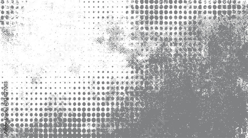 Grey and white abstract pattern of varying sized dots and speckles