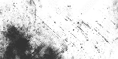 Black ink splatters and distressed halftone pattern on white background spray