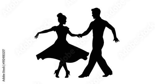 Silhouette of a dancing couple in a romantic waltz pose.