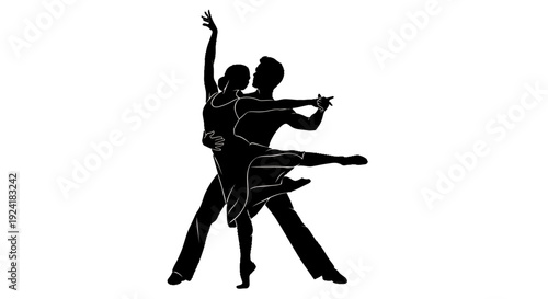 Silhouette of a dancing couple in a dramatic pose.