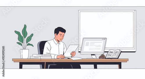 Man sitting at office desk with computer.