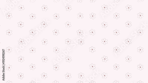 Simple and sweet pattern of small hand drawn pinkish flowers repeats across a soft pale pink background for nurseries.